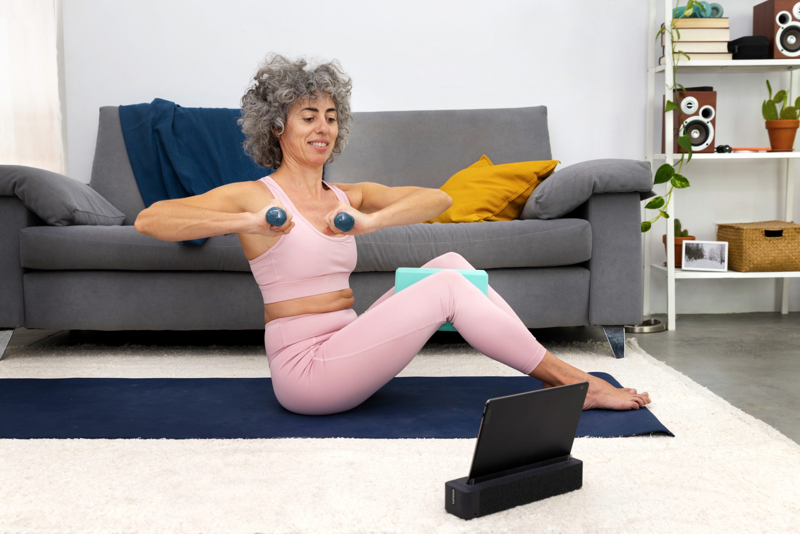 woman exercising with dumbbells